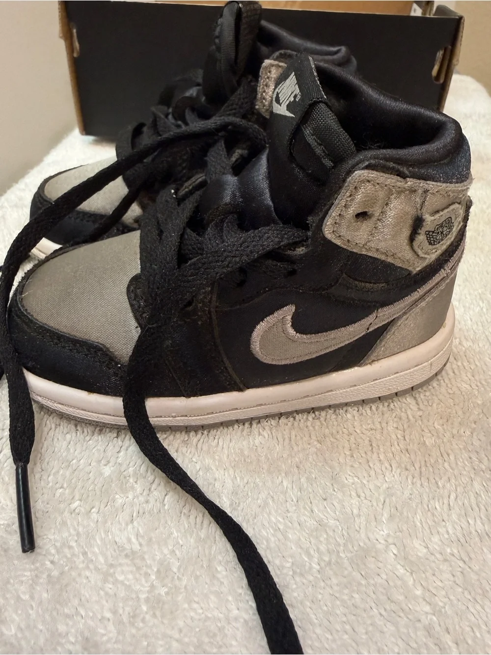 Nike Kids Black and Silver High-Top Sneakers with Metallic Accents
